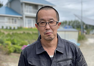 「Dream Feed Kitami 」の一員と して、草地、デントコーンなど計400ha の圃場管理部門を担う荻野さん。